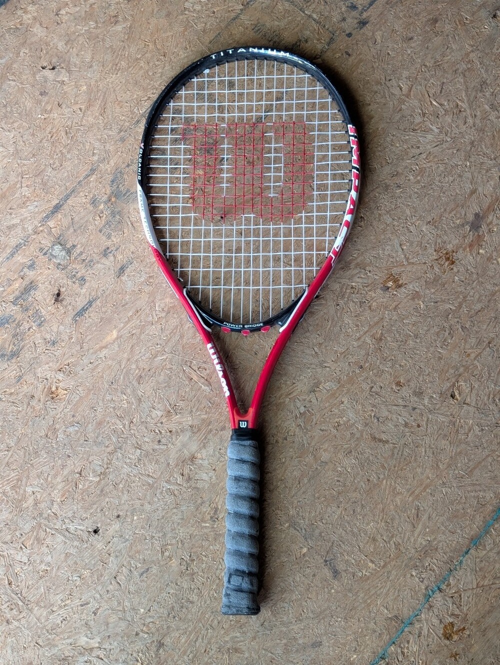 Wilson Red and Black Tennis Racket with Gray Grip